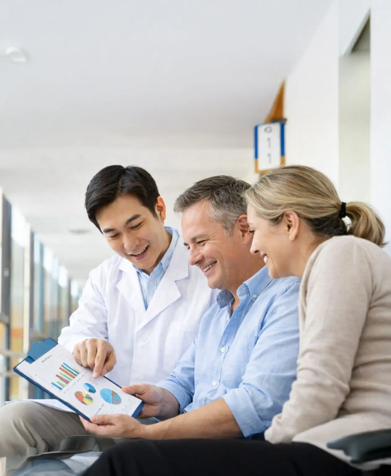 A doctor talking a couple through their results.