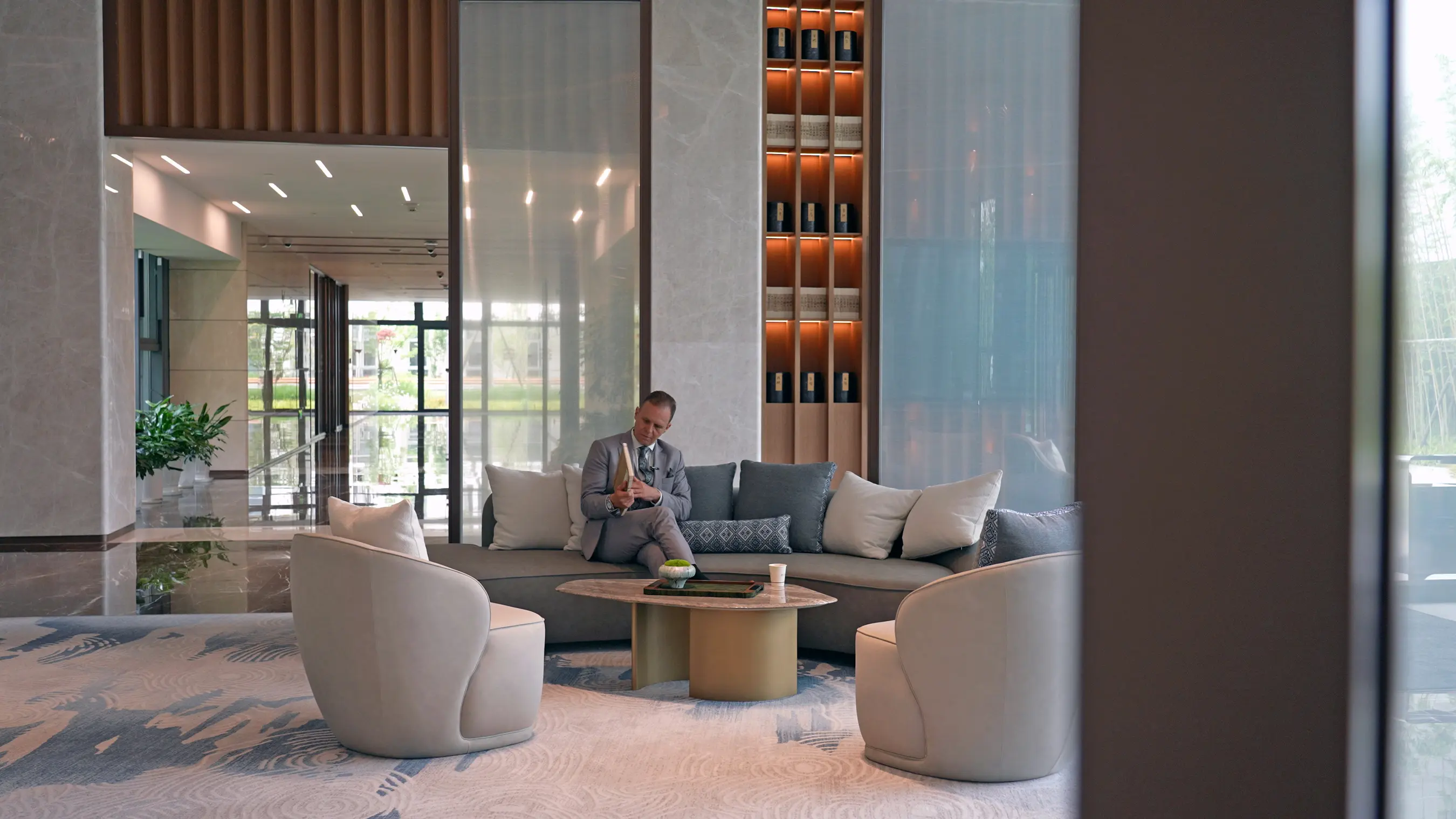 A guest relaxing in the lounge between assessment stages.