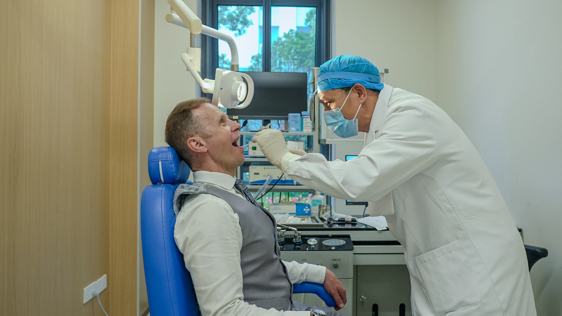 A mouth swab sample being taken for laboratory analysis.