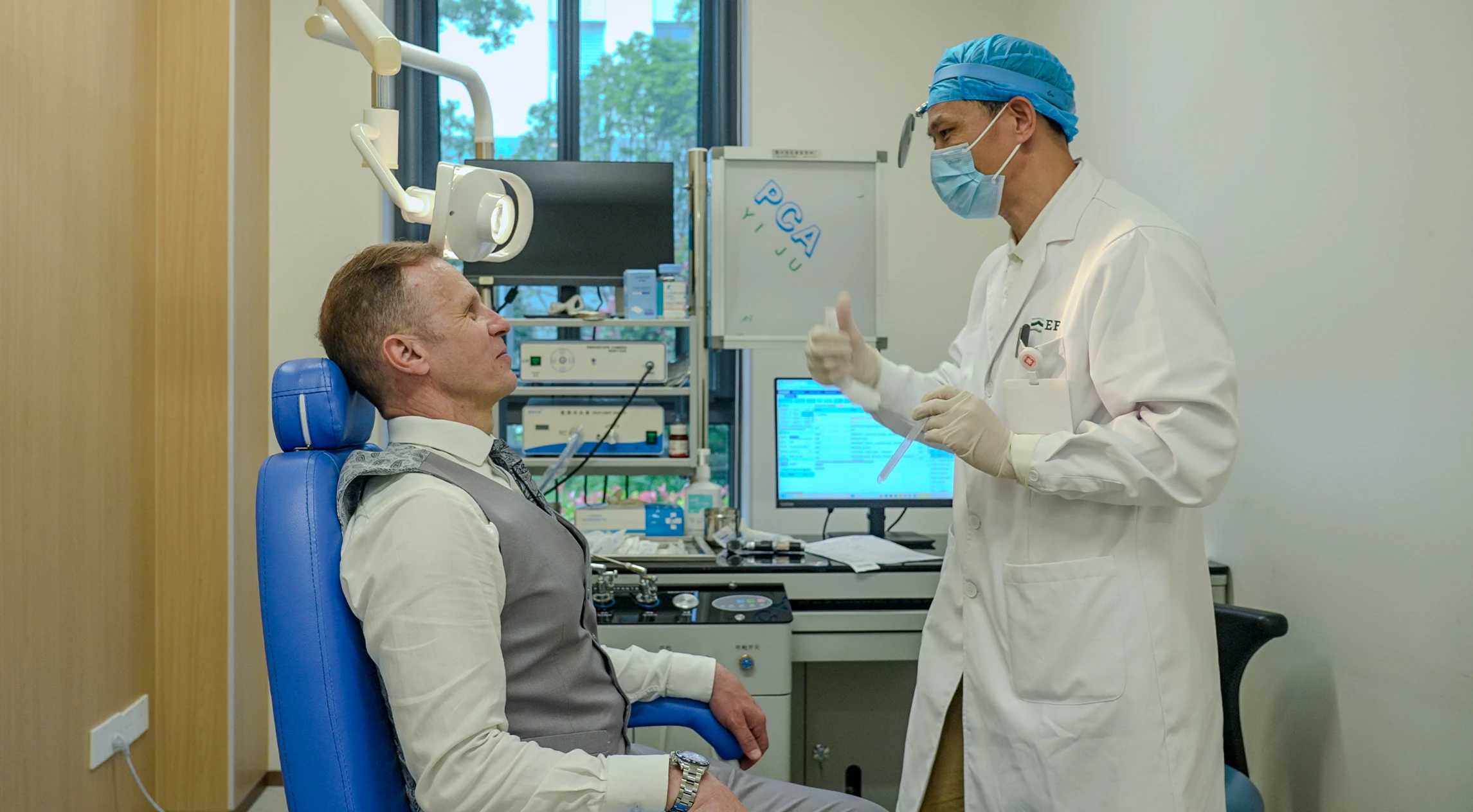 A smiling patient during their physical examination.